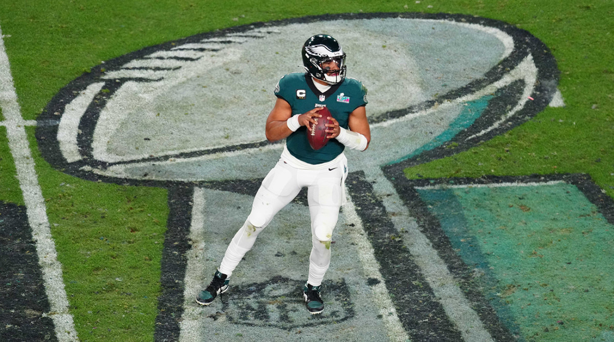 Eagles quarterback Jalen Hurts (1) drops back to pass against the Chiefs during the second half in Super Bowl LVII at State Farm Stadium.